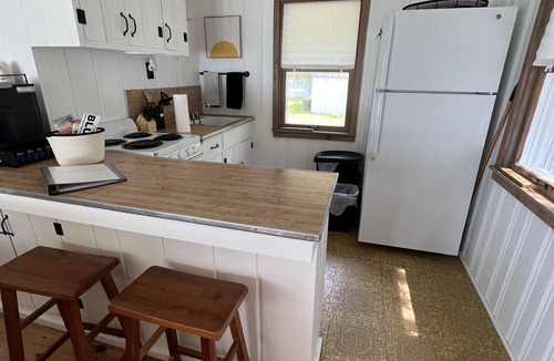 Baileys Harbor House | Sunset Facing Cozy Lakefront Cottage on Beautiful Kangaroo Lake