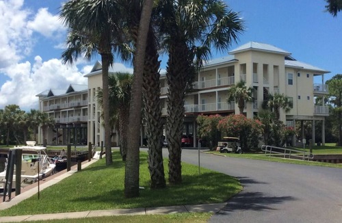 Suwannee Condo | Sunsets, Canal Front, FISH, FISH, FISH! Suwannee Cove - Unit 207, Boat Slip 23