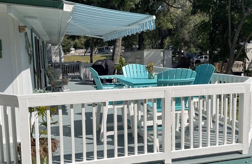Fort McCoy RV Rental | Super roomy Park Model in premier resort with lake, pools, dock and boat launch.