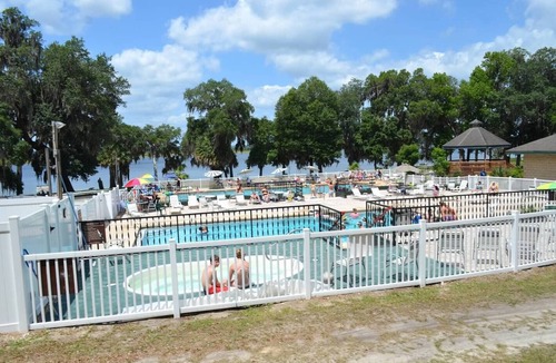 Fort McCoy RV Rental | Super roomy Park Model in premier resort with lake, pools, dock and boat launch.
