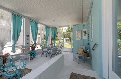 Rio Vista House | The Adorable Blue Bungalow- Pet Friendly with a fully fenced in back yard.