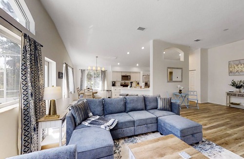 Indian Trails House | The Barefoot Bungalow House in Palm Coast With an Enclosed Pool & Grill