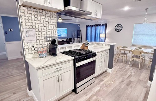 Goldenrod House | The Canopy on Periwinkle- A Home Away From Home