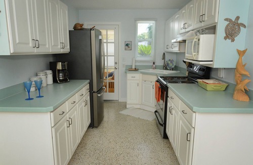 Seaside Homes House | The Dolphin House! Heated Pool home. Unlimited well mannered Pets Welcome