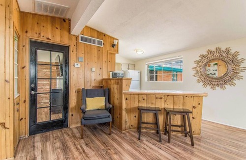 Midtown Apartment | This centrally located 1 bedroom features a full size pool and electric vehicle charging on site.