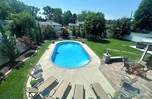 Ashwaubenon House | Titletown Gem: Steps to Lambeau, Heated Pool, Hot Tub & Entertainment HQ