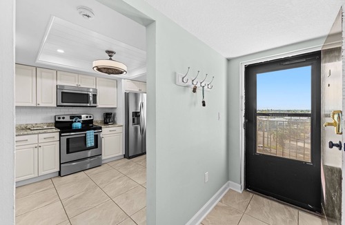 Satellite Beach Condo | TOP END UNIT, OCEANFRONT, 2024 RENOVATED, BARN DOOR Master shower, GORGEOUS