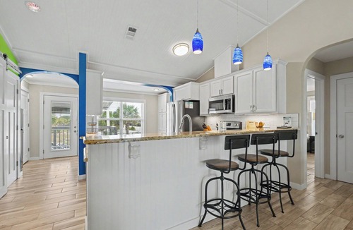Villa Segunda House | Tranquil covered deck with Gulf views, private pool and easy beach access.