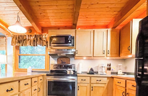 Herbster Cabin | Tranquility & Adventure Await at the River's Edge