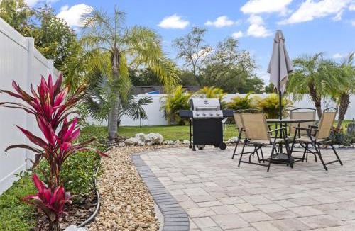 Crystal Lake House | Tropical Fenced Paradise, Hot Tub, & Home Theater