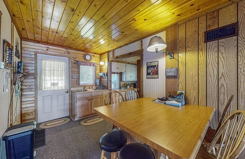 Eagle River House | Two cozy, lakefront cottages w/2 docks, a patio, firepit, 2 gas grills, & WIFI