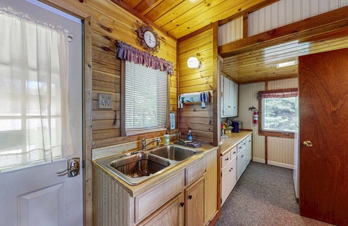 Eagle River House | Two cozy, lakefront cottages w/2 docks, a patio, firepit, 2 gas grills, & WIFI