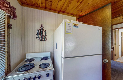 Eagle River House | Two cozy, lakefront cottages w/2 docks, a patio, firepit, 2 gas grills, & WIFI