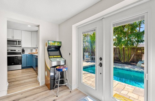 Seacoast Shores House | Ultimate Beach Oasis: Heated Pool, Game Room, BBQ & Pet-Friendly 🏖️