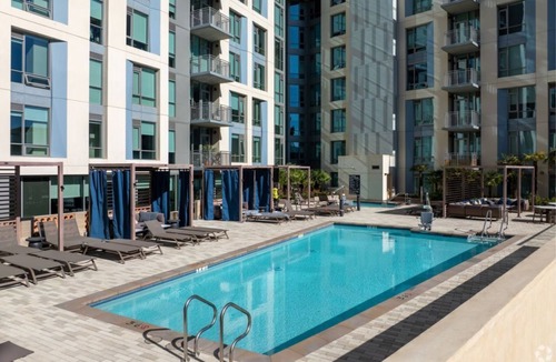 Heritage District Condo | Unwind & Relax – The Martin 1BR Condo with Pool