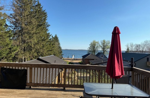 Shawano Condo | Updated 3-bedroom 2nd floor upper unit on shawano lake with pier