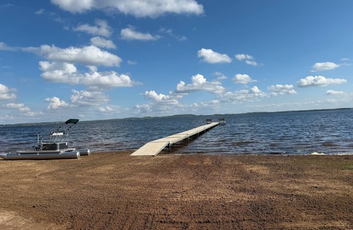 Shawano Condo | Updated 3-bedroom 2nd floor upper unit on shawano lake with pier