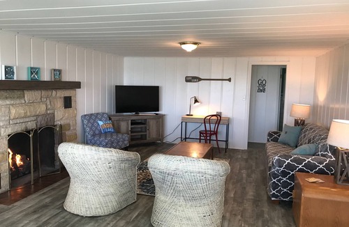 Pigeon House | Updated Cottage with Large Deck & Private Beach on Caseville's Sand Point