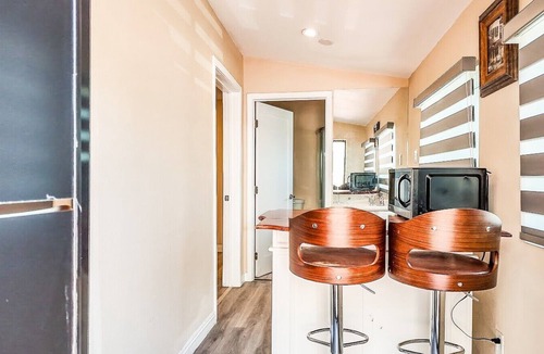 Park Mesa Heights Apartment | @ View Suite with private entrance, Lounge and sofa bed and bar.