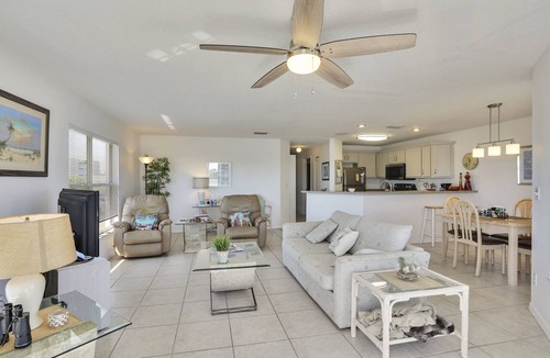 Treasure Island Condo | Water Views - Walk to Beach and Restaurants - Waterfront Pool - Low Density