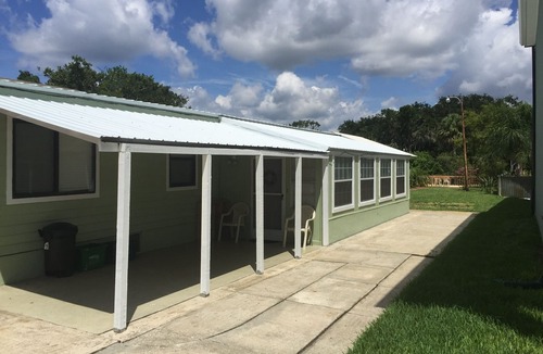 Indian Harbor Estates House | Waterfront Canal Cottage -Fisherman's Paradise w/25 ft dock