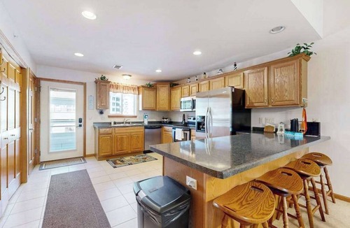 Lake Delton House | Waterfront condo with shared pools, hot tubs, beach, lake access, WiFi & A/C