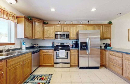 Lake Delton House | Waterfront condo with shared pools, hot tubs, beach, lake access, WiFi & A/C