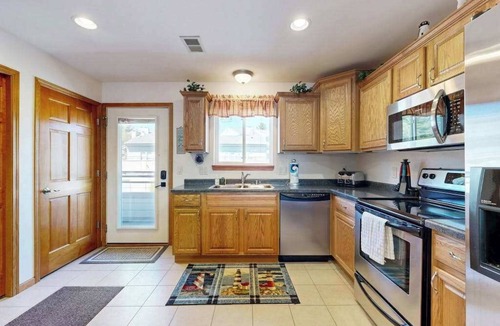 Lake Delton House | Waterfront condo with shared pools, hot tubs, beach, lake access, WiFi & A/C