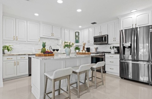 The Cove House | Waterfront Oasis Heated Pool Game Room Gym