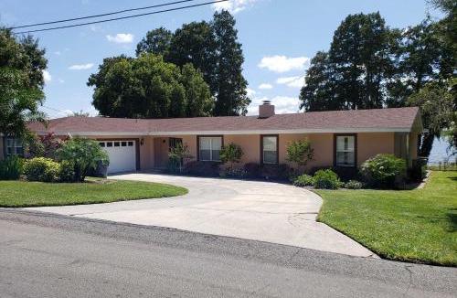 Winter Haven House | Waterfront Winter Haven Home with Dock & Hot Tub!