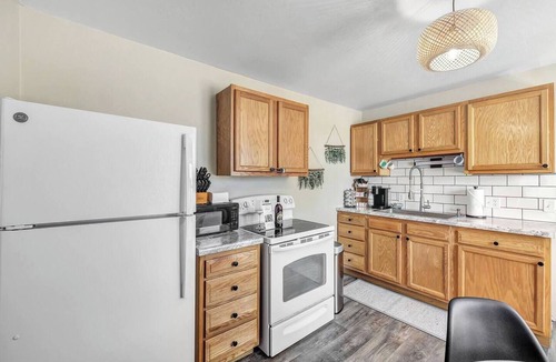 Algoma Apartment | Welcome to The Steele Magnolia! Completely renovated 2 bed/1ba plus bonus pull out futon couch. We are located directly across the street from Von Stiehl Winery and are just a few minutes walk to Crescent Beach!