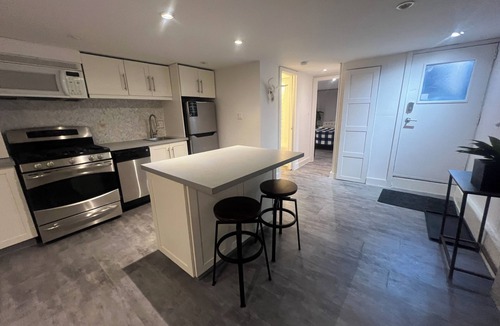 Weston House | Weston Village Lux Stunner! Private fenced backyard garden, fireplace, marble…