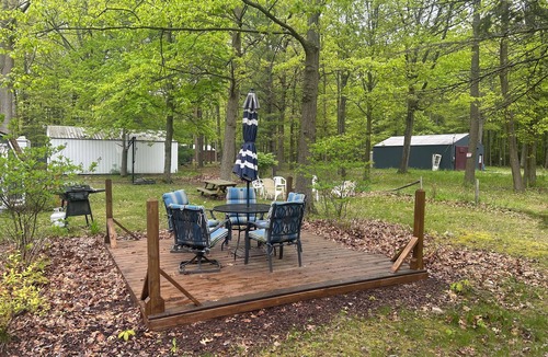Caseville Cottage | ‘Whispering Oaks’ Cottage with Private Lake Access, Outdoor Fire Pit and More!