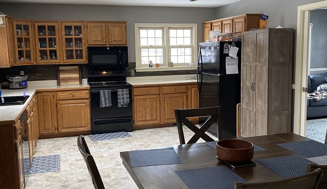3 bedroom/2 bath home; close to EAA. Large kitchen and outside deck area