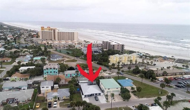 3rd house from beach with heated pool & tiki bar. 2 master suites + 2 bedrooms.