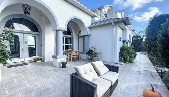 Barrier island water front luxury villa w dock near beaches and Disney Orlando