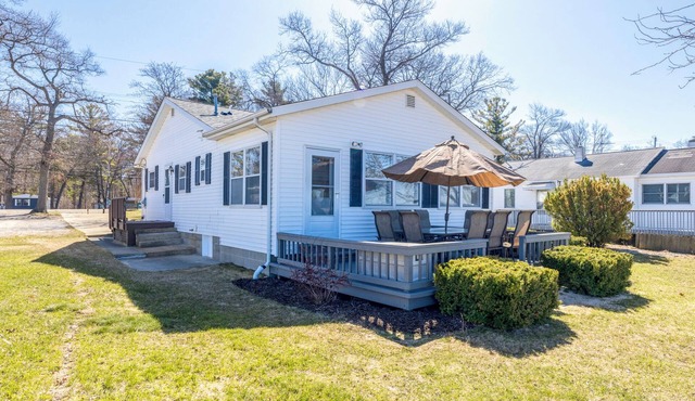Beach House in Caseville w/50ft sugar sand Lake Huron frontage on the property.