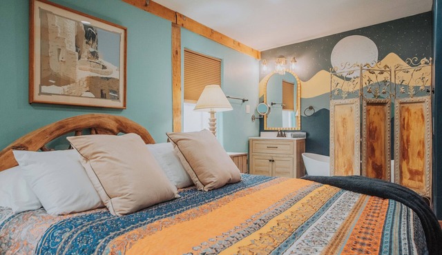 Beautiful and fun 5 bedroom house with a hot tub, arcade games and lots of room.