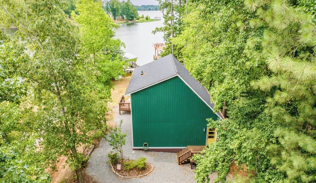 Beautiful lake front cottage, deep water lot with covered dock and amenities.