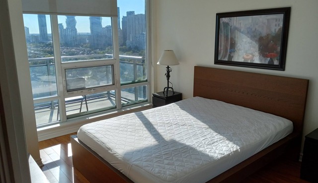 Bright and sunny corner unit with Balcony. Walk to Square One Shopping Mall.