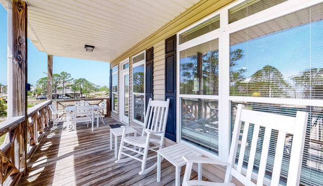 Bright duplex with two full kitchens, large decks, and private washer/dryers