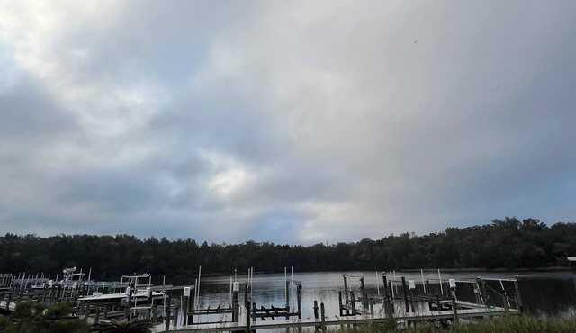 Charming 2 bedroom condo with waterfront views. Community pool!