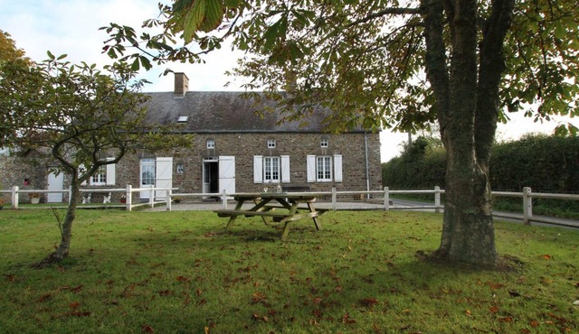 Charming Stone House with Garden Near Surville's Protected Beaches