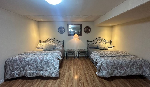 "Cozy, private basement with kitchenette, washroom, and small gym.