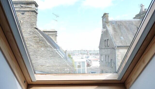 Duplex overlooking the port in the heart of the city.