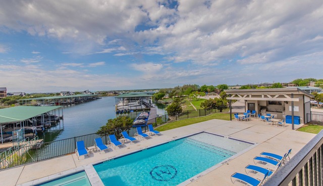Lake front Condo 2BD/2BA w/pool, hot tub, fire pit, gas grills, gym, & laundry.