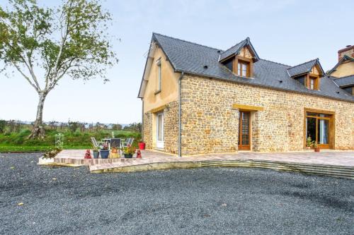 Maison charmante à Saint-Marcouf avec jardin.