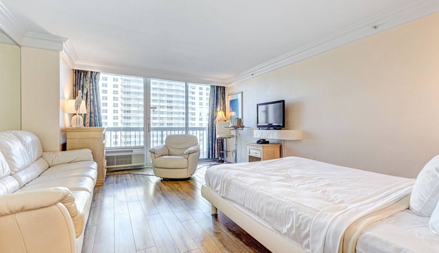 Ocean-view resort room with fitness center, beach access, AC, & high-speed WiFi