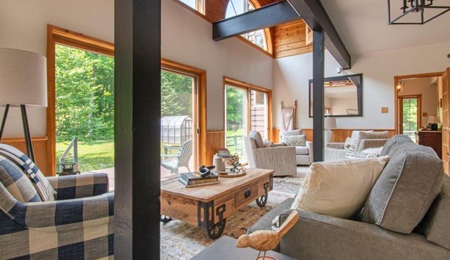 Regally rustic, spacious 2-home waterfront getaway for 16+ with total privacy.