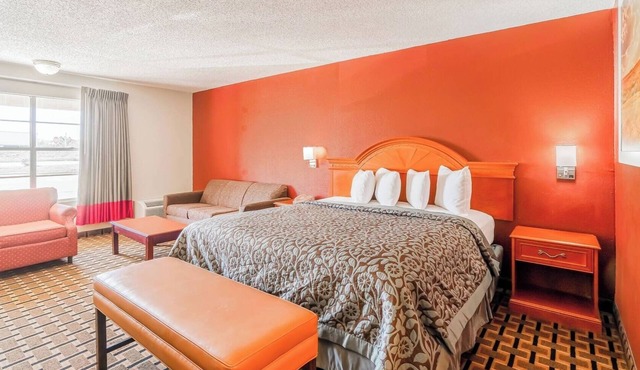 Relaxing Large Room with King Bed & Modern Extras for Travelers’ Comfort